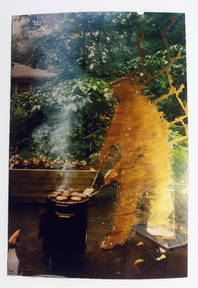 A photograph of a figure that no longer exist grilling hamburgers