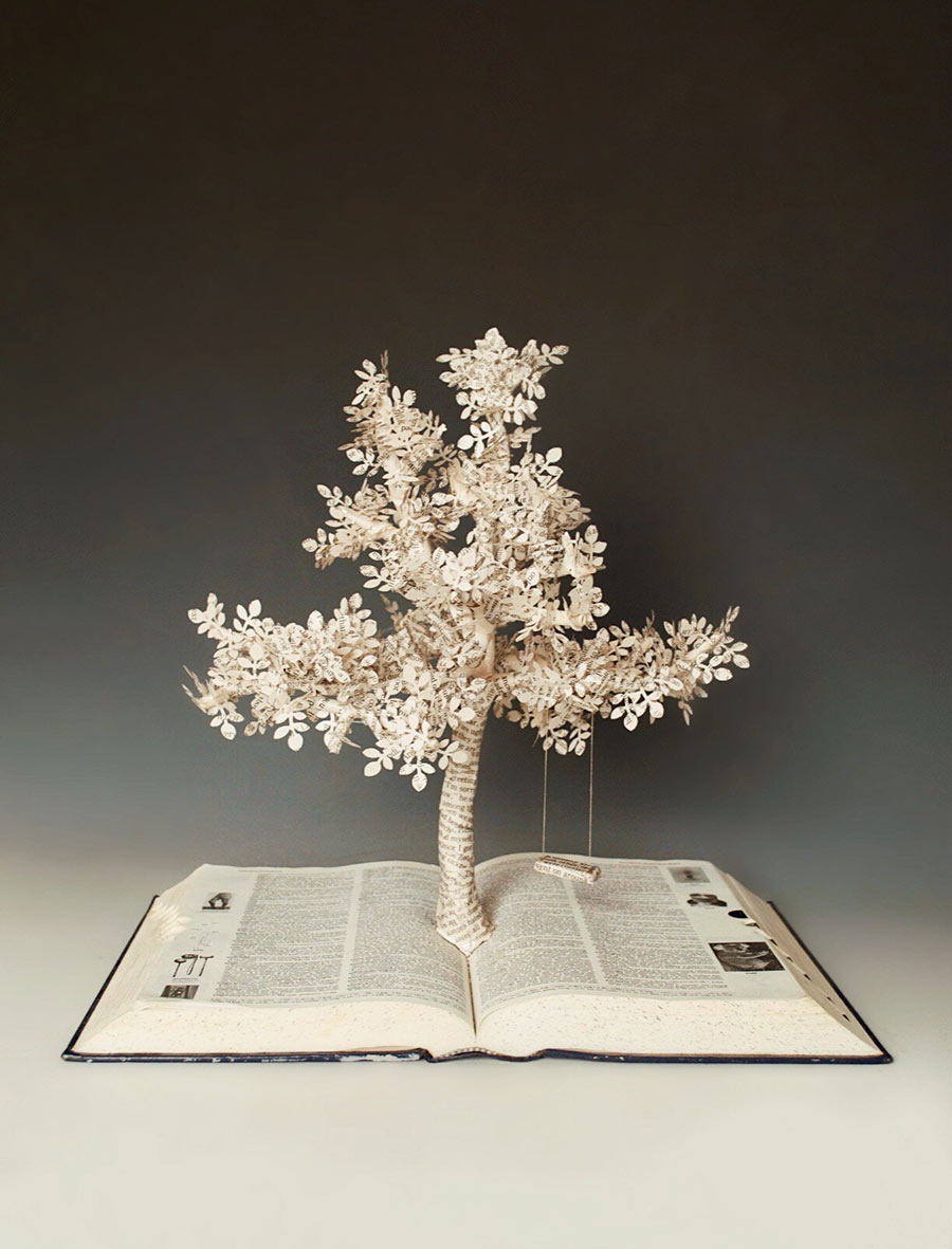 Hanna Bewley's artwork - book with tree coming out of center made out of what looks like paper from the book