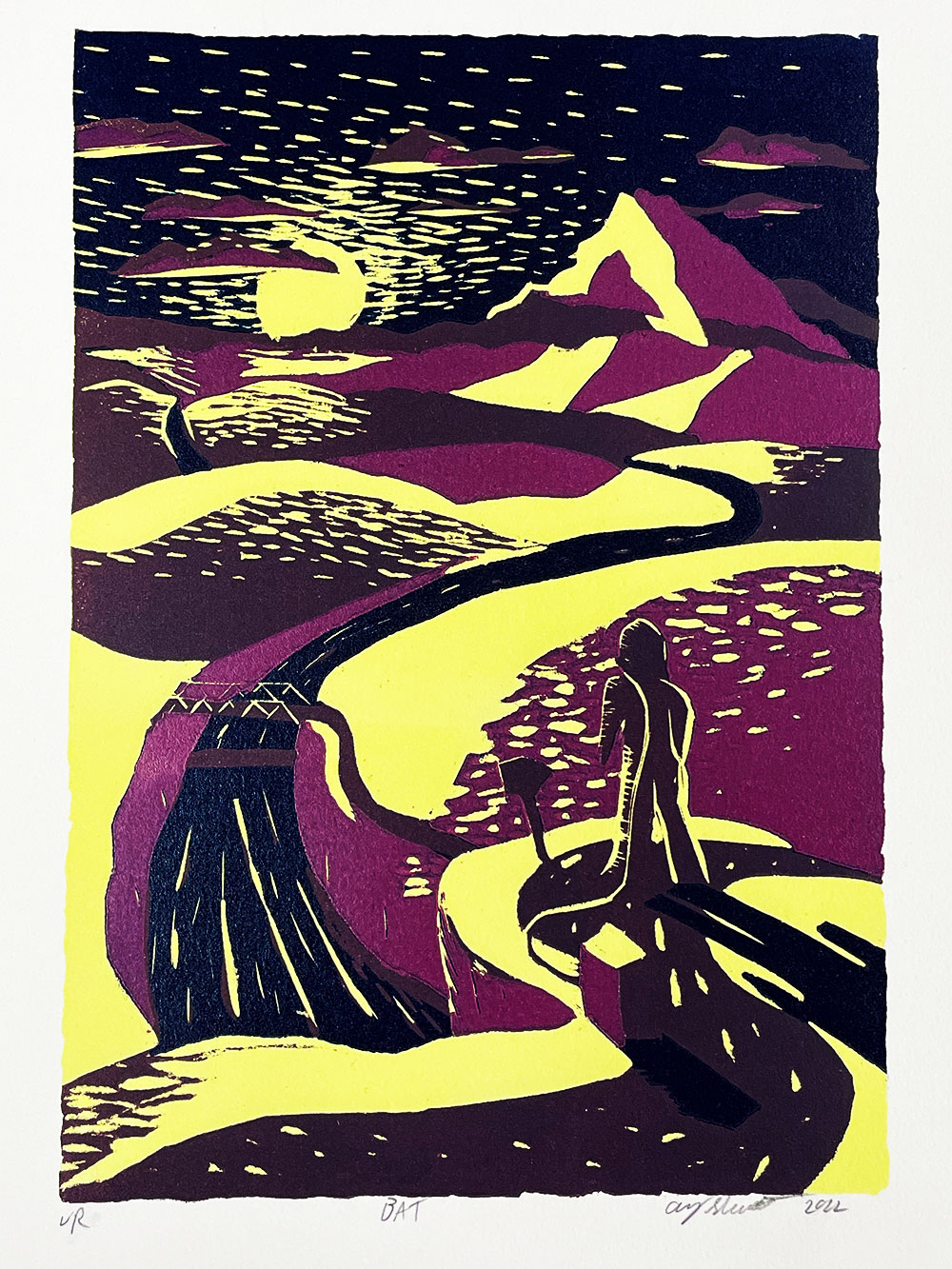 A printed image composed of a human walking alone in the desert - in the distance you can see a mountain and the sun beginning to set. Printed using various shades of purples and yellows.