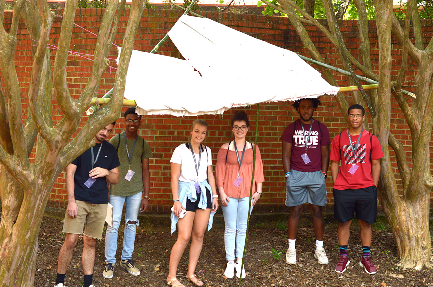 Group photo of students and their shelter
