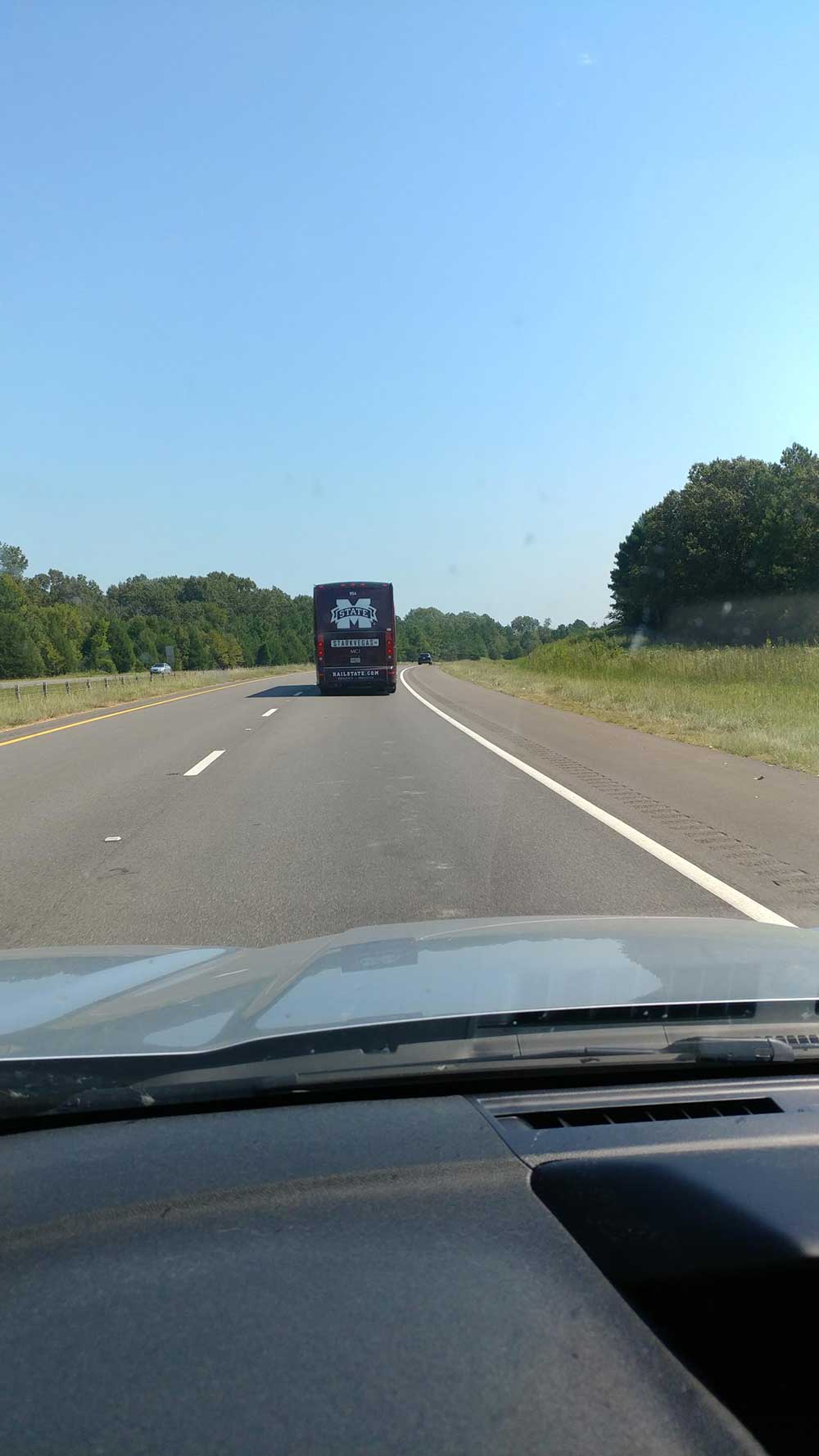 view from car of Hail State bus