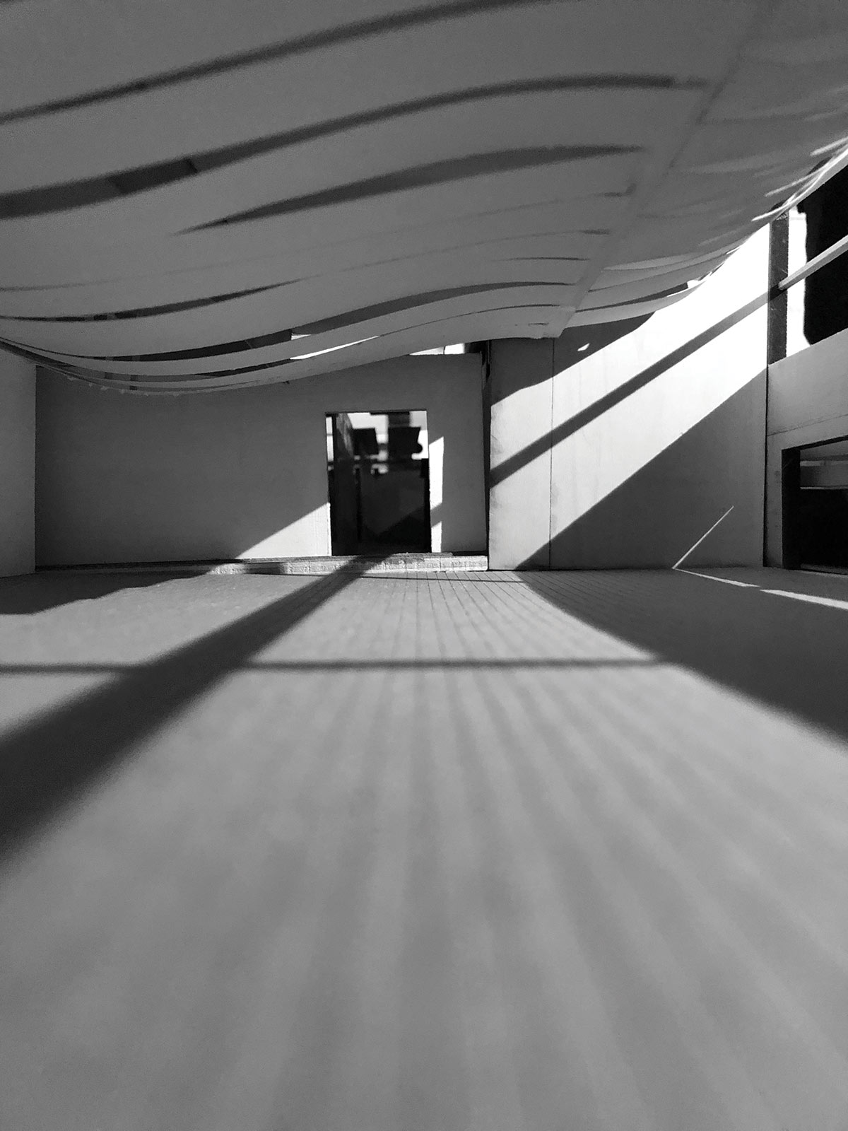 black and white photo of an interior of a model