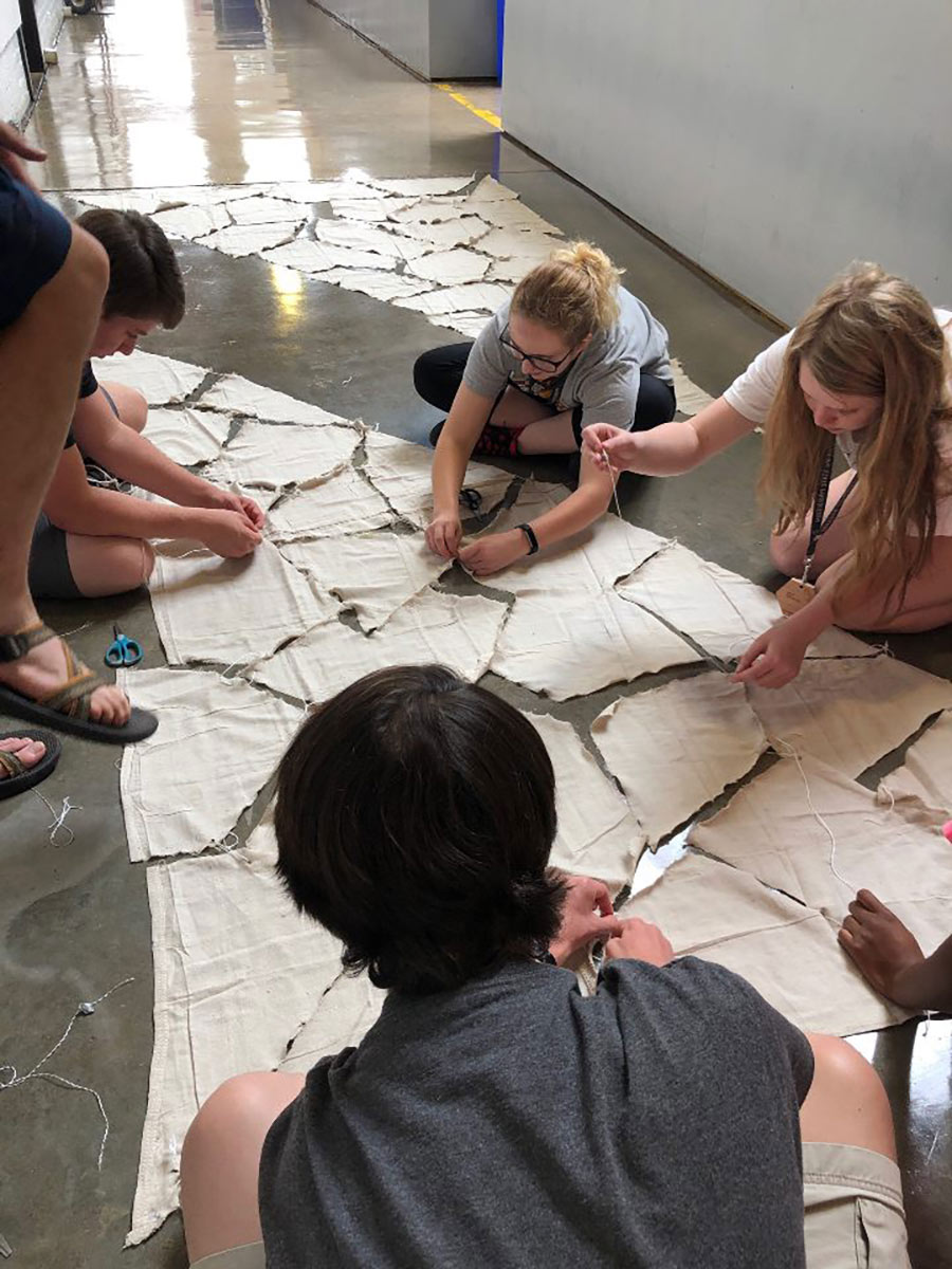 group of Design Discovery campers work in Giles Hall with their instant environment