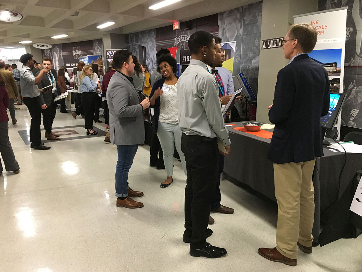 architecture students talk with potential employers at the MSU Career Expo