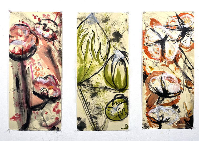 Three vertical paintings depicting details of cotton plants with paint splatter in red, green, and orange.