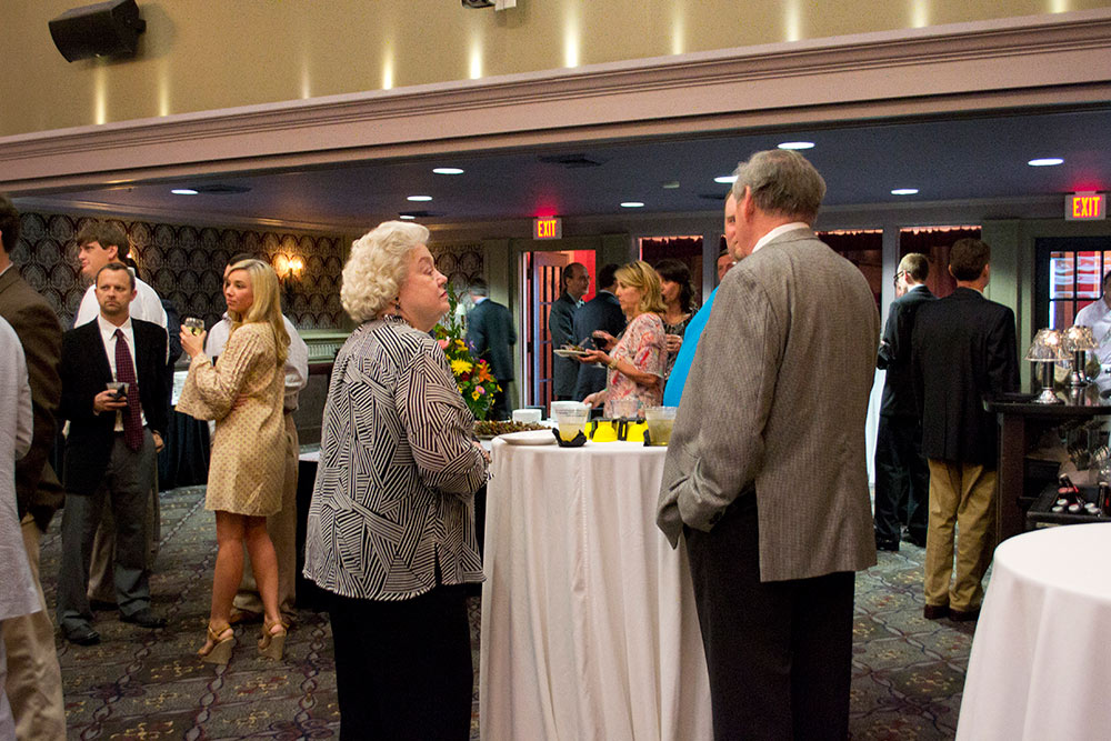 guests mingle at the banquet