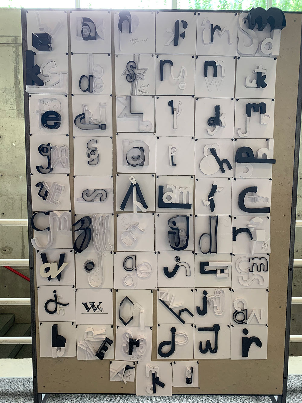 a board with all the students&#039; logo letter projects