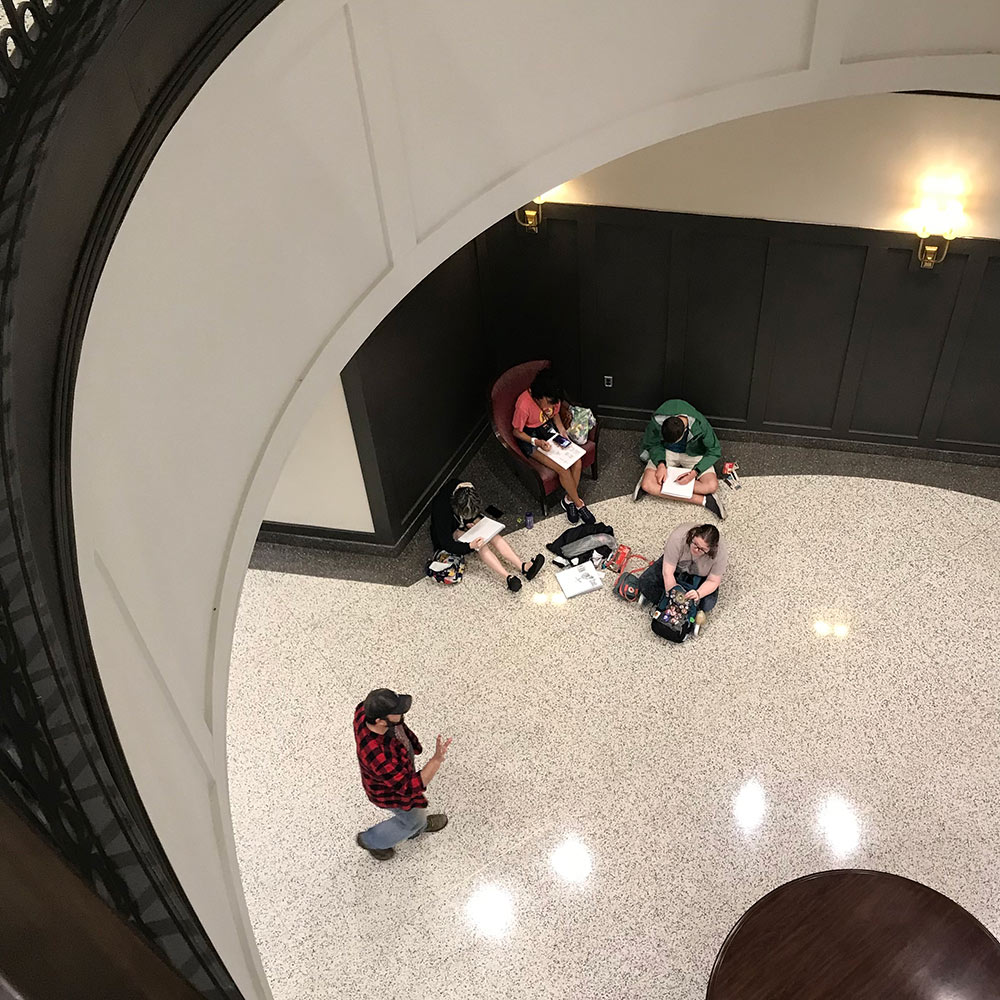 view from top of students sketching