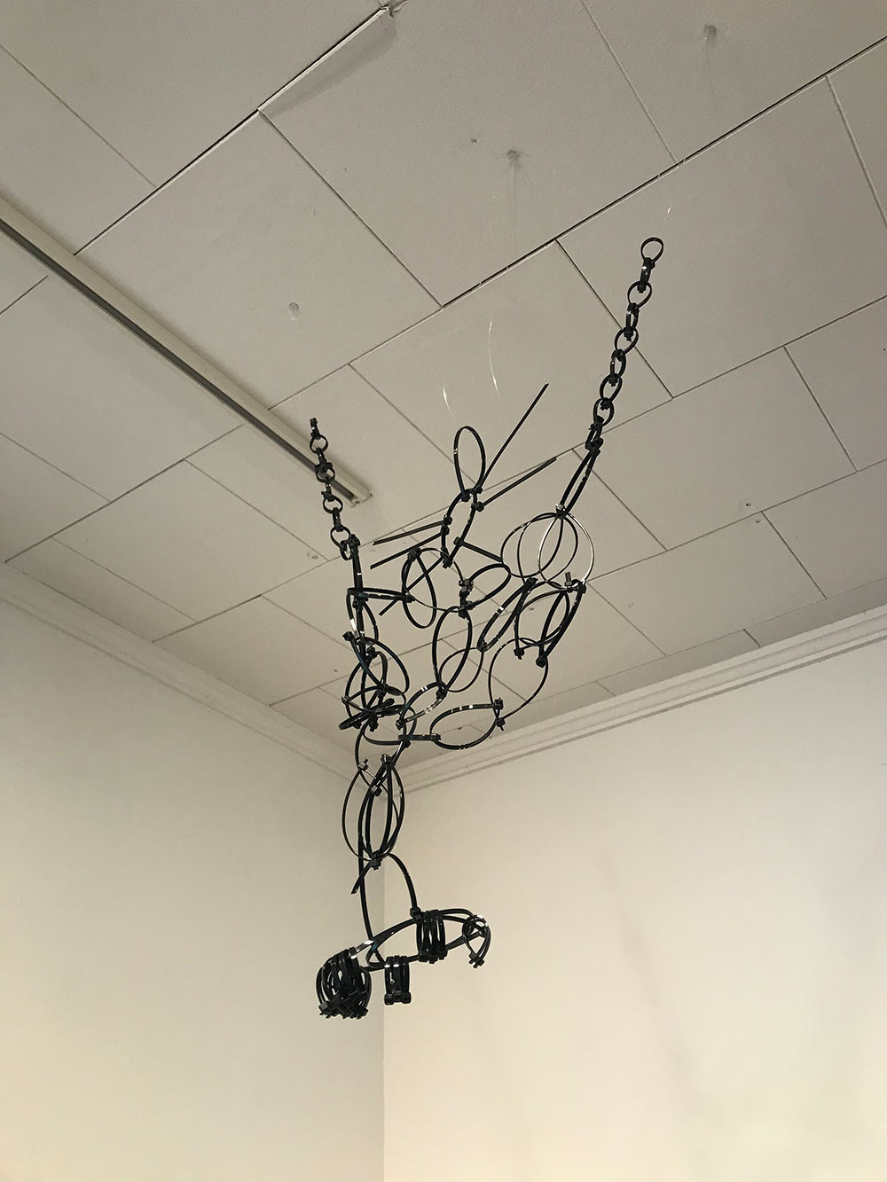 view of art piece hanging from ceiling in Visual Arts Center Gallery