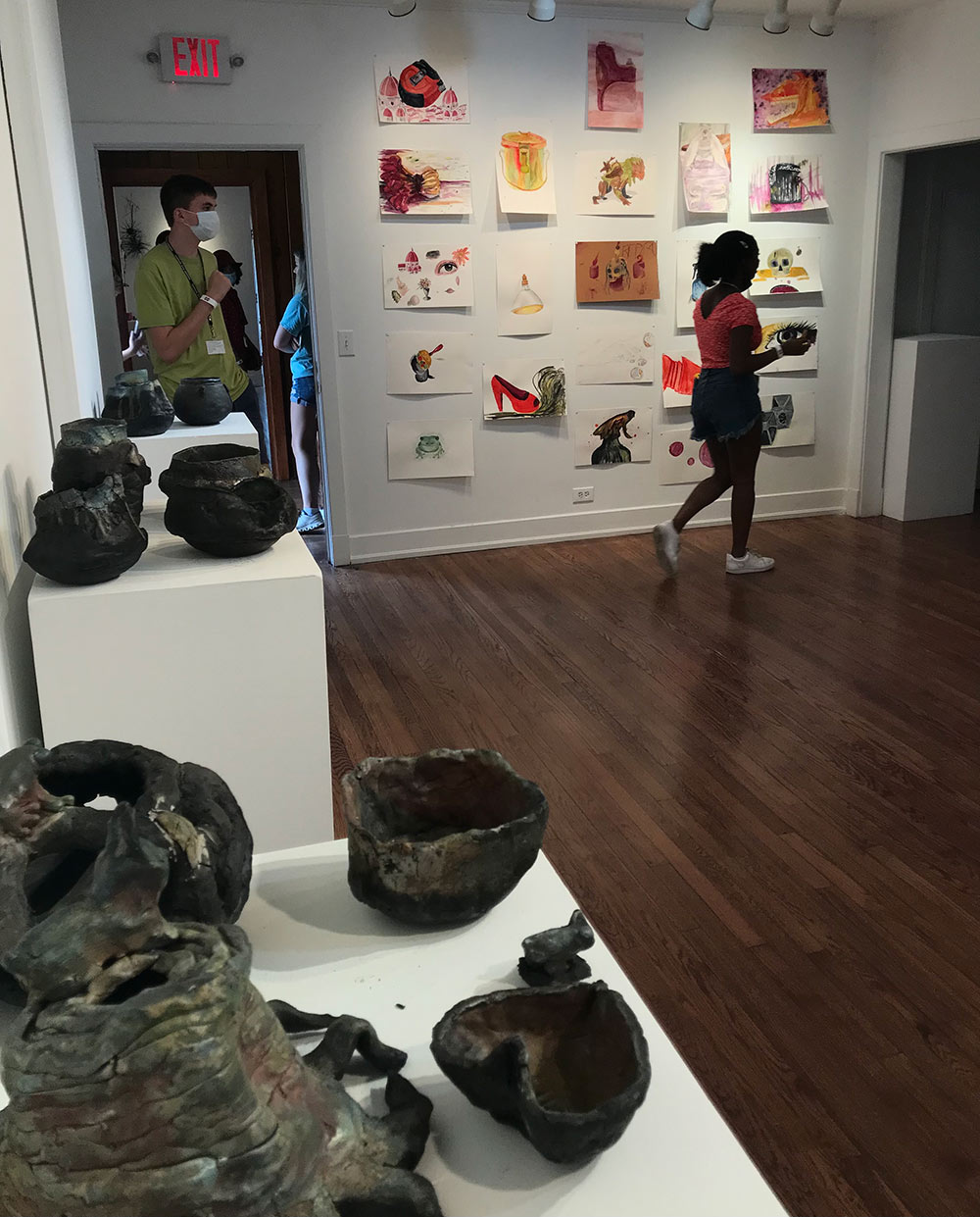 view of Visual Arts Center Gallery with campers&#039; work on display