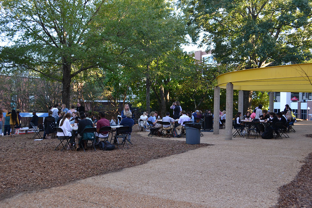 Participants of the Design Leadership Foundation’s Professional Horizons Workshop enjoy a barbeque outside of Giles with live music.