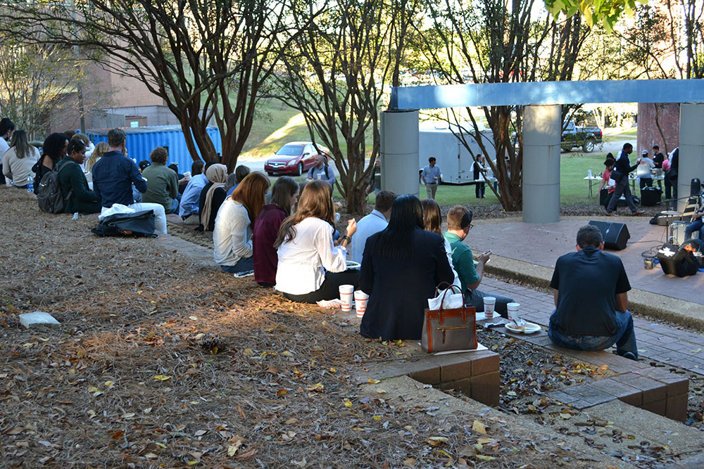 Participants of the Design Leadership Foundation’s Professional Horizons Workshop enjoy live music outside of Giles.