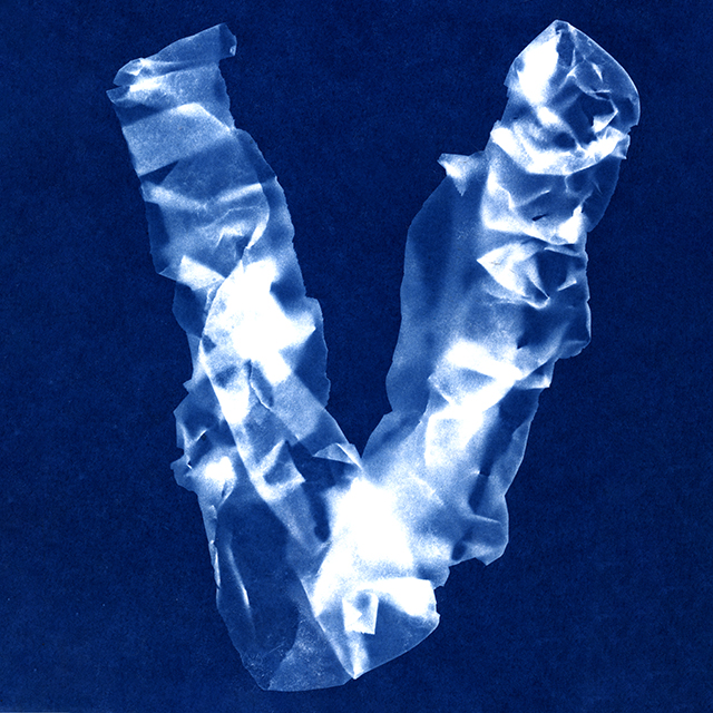 Image of a crumpled letter V