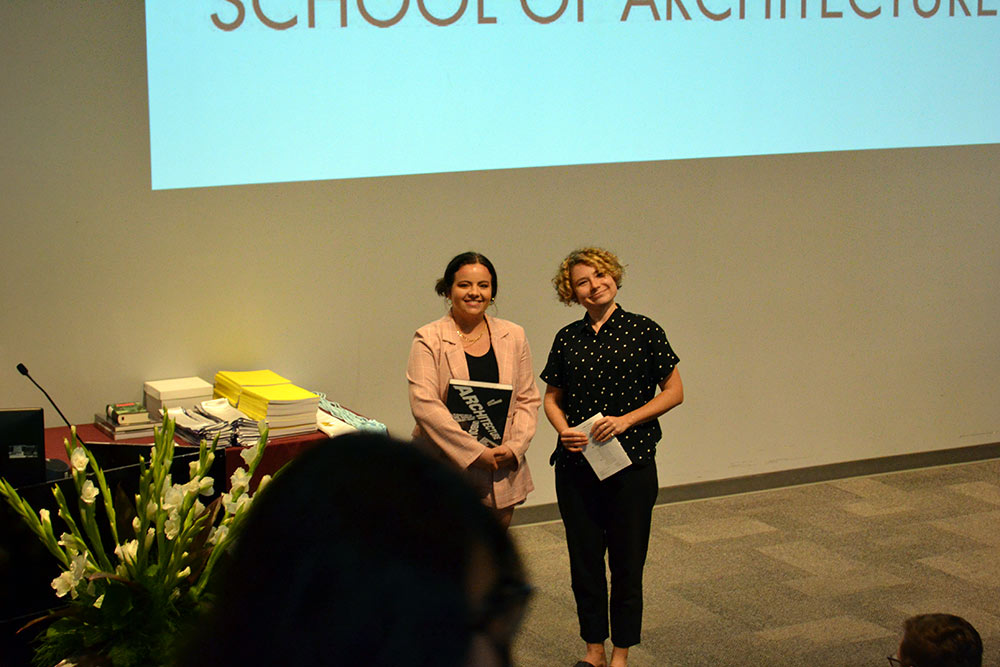 Second-year Faculty book award recipient Caeli Finch, left, with Dr. Kate Malaia