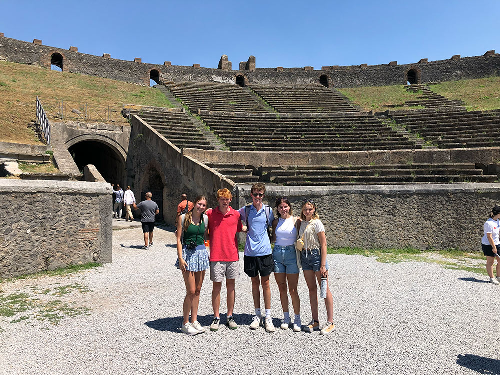 Group poses in Coliseum.