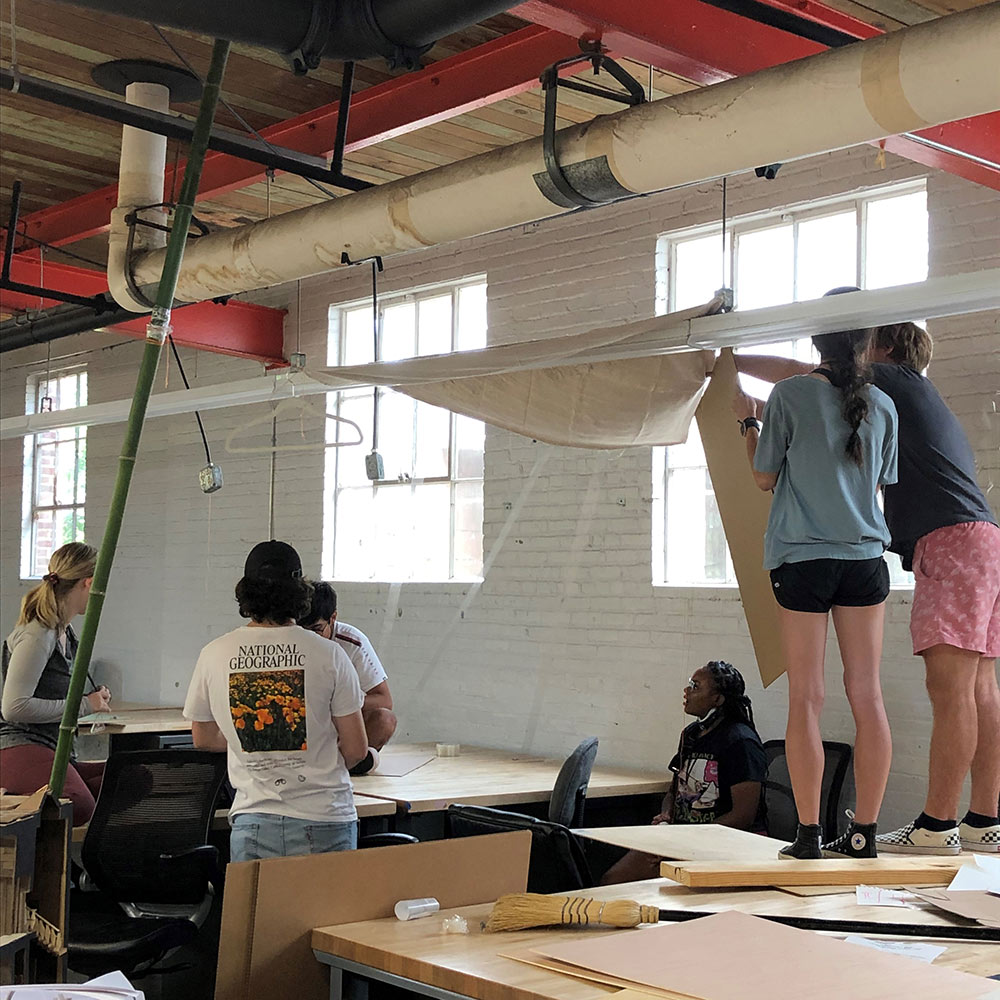 Design Discovery campers work on their instant environment project