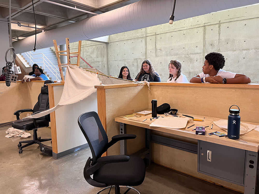 Group of Design Discovery campers working on their instant environment project.