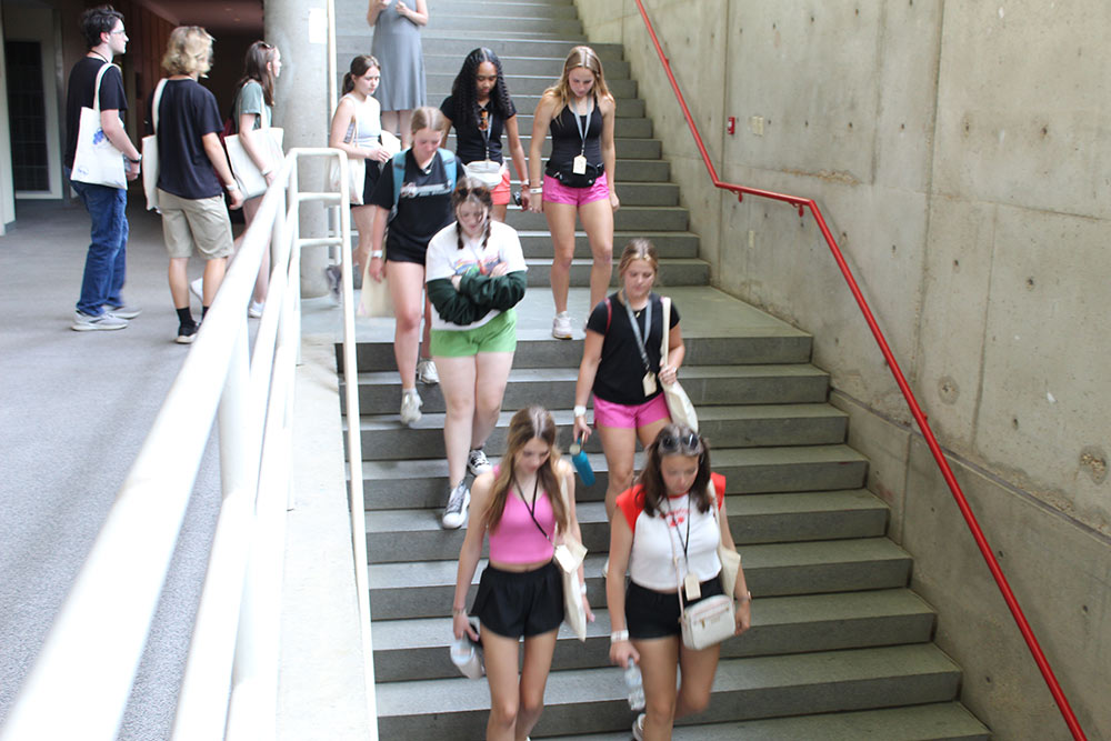 Group of Design Discovery campers walking down flights of stairs.