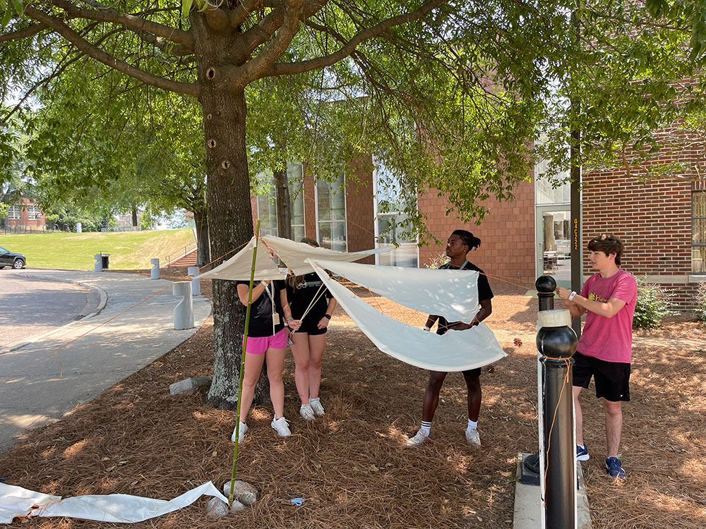Group of Design Discovery campers working on their instant environment project.