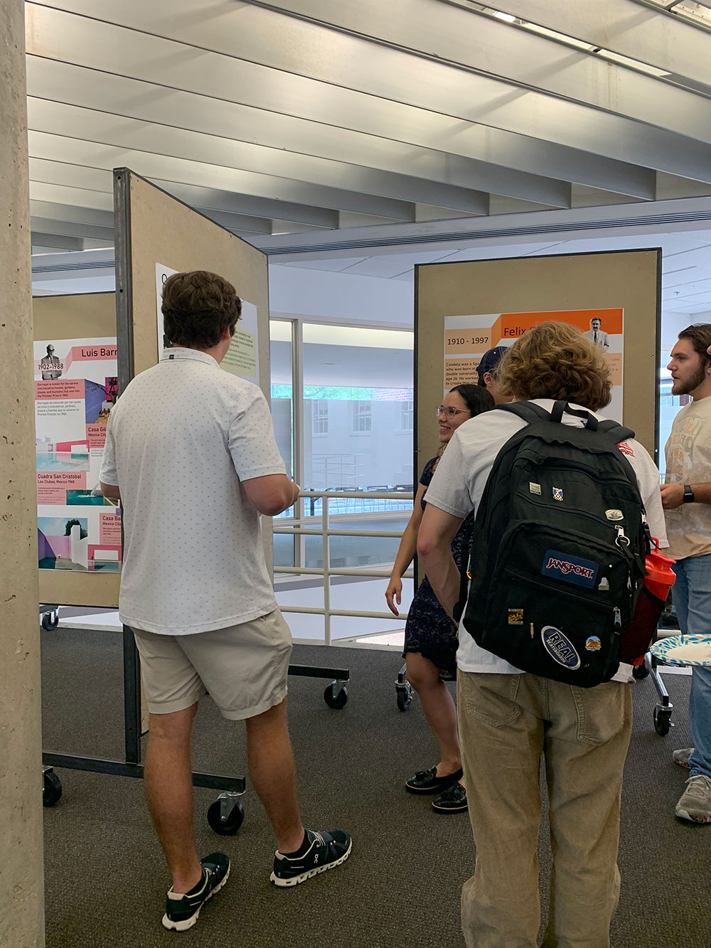 Groups of students admiring the showcased exhibits.