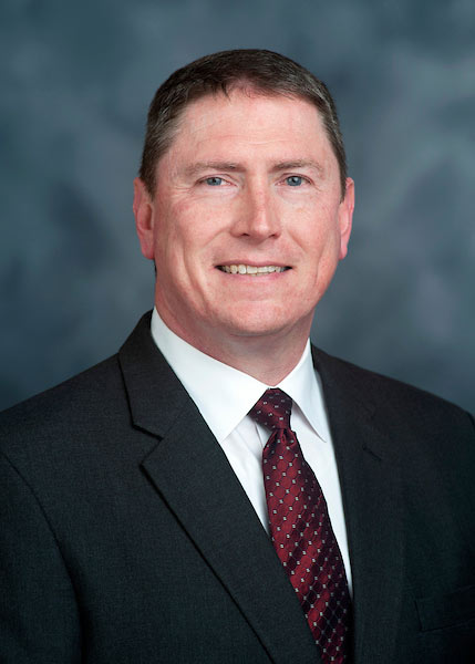 headshot of Edward McGinnis