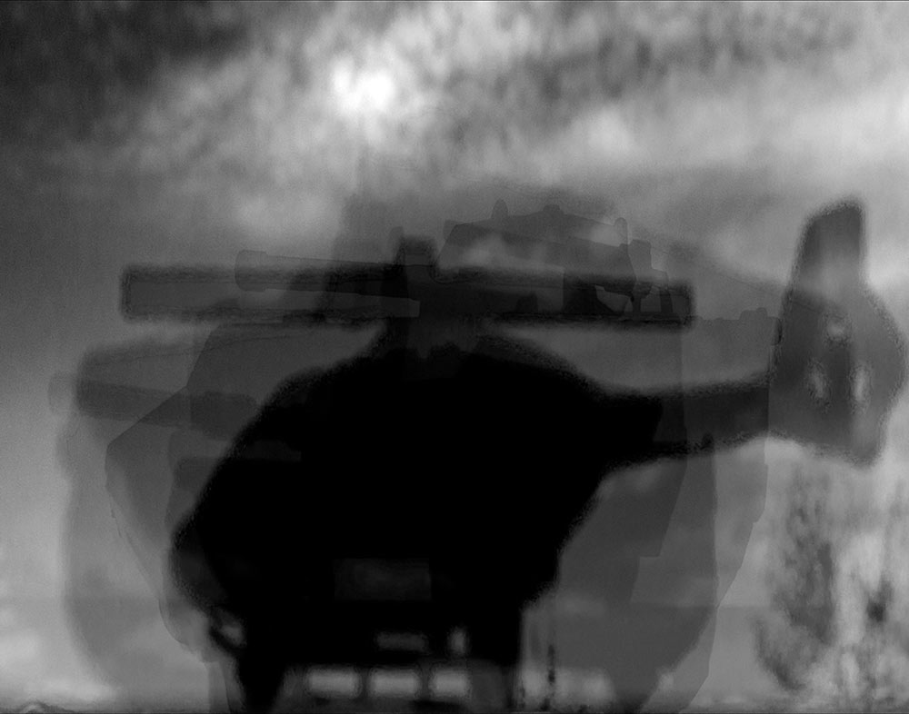 blurry black and white image of helicopter