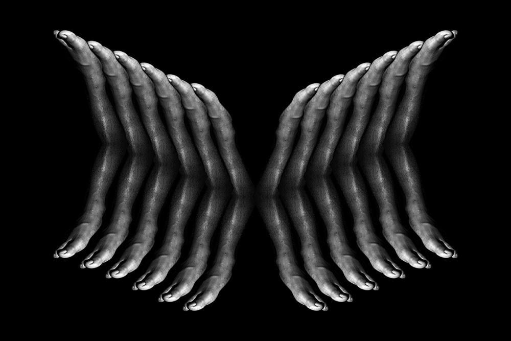 black and white image of the side of a foot repeated to look like a wing