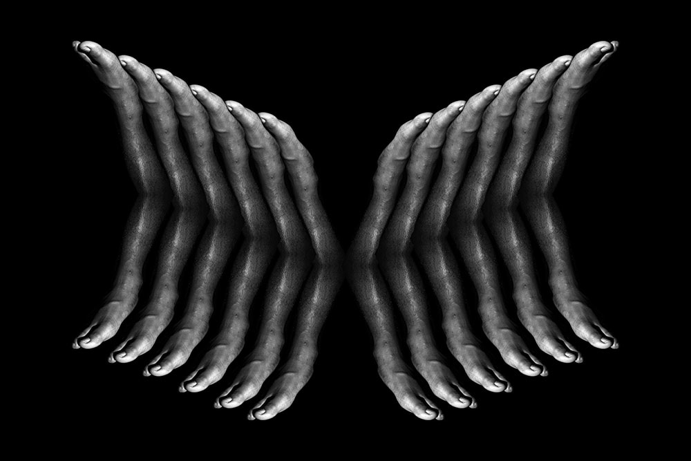 black and white image of the side of a foot repeated to look like a wing