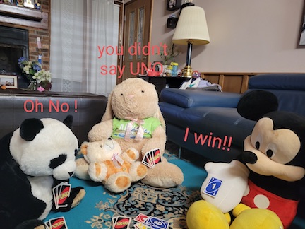 Image of stuffed animals gathered around and having a chat