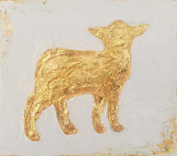 Sculpture of lamb in gold.
