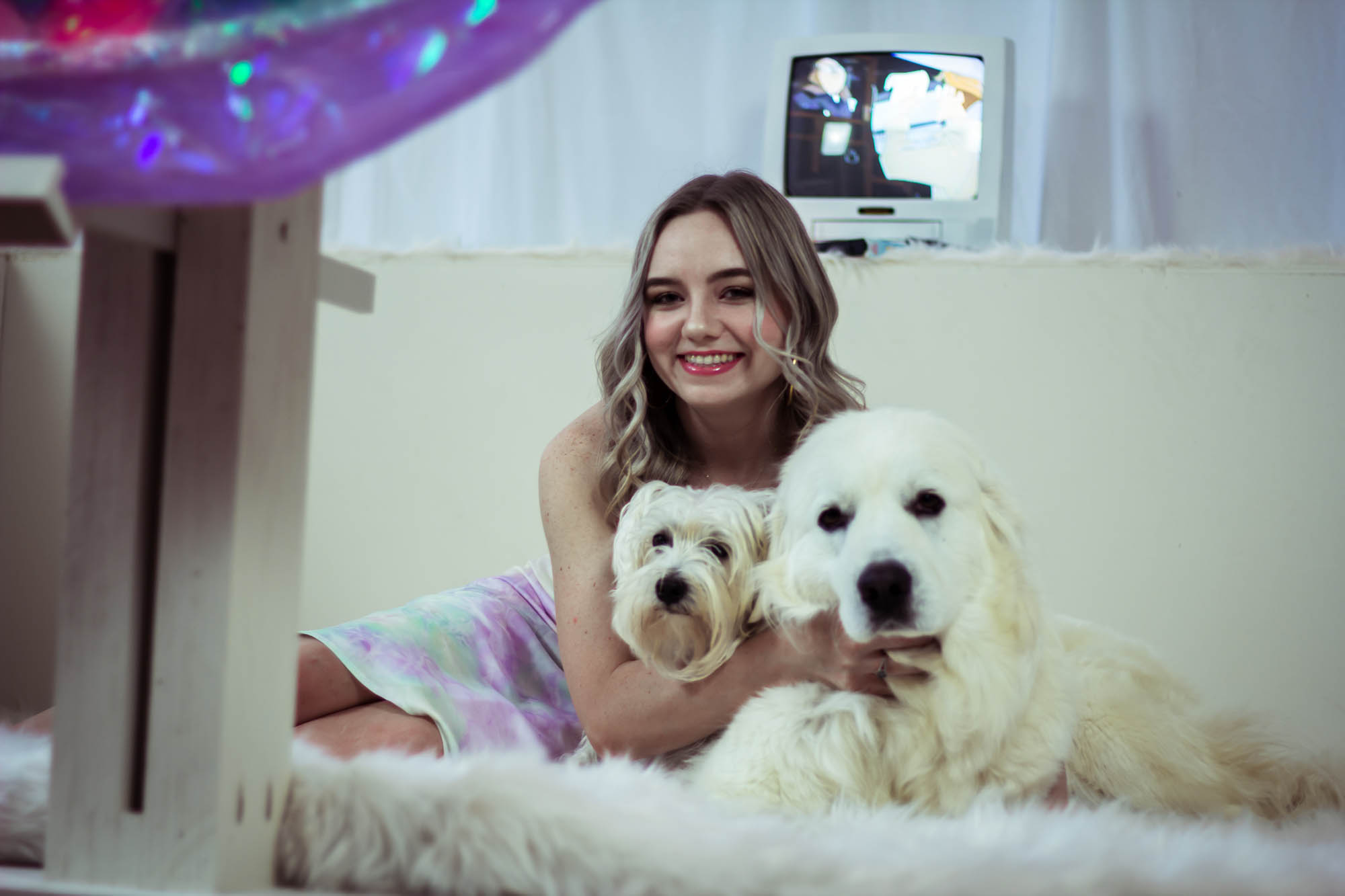 My dogs are a huge inspiration for all of the white fur. I wanted to create an inviting and comforting environment for my viewers. I just knew if I could include my puppies comforting fur that it would complete the experience.