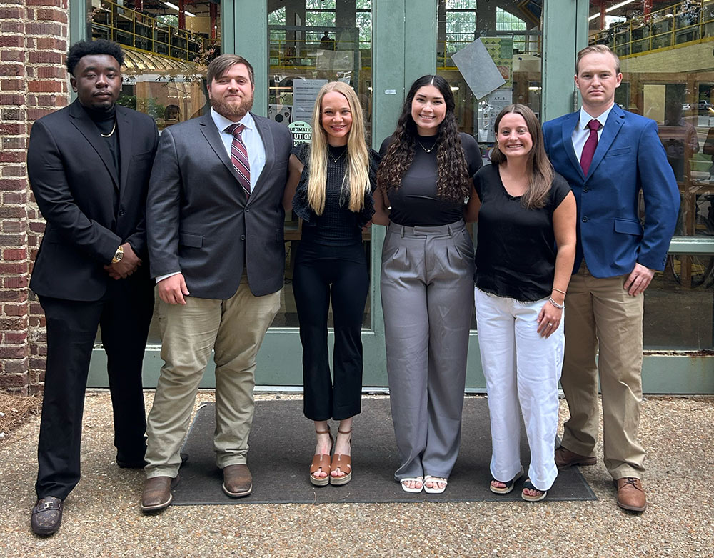 group gathered for photo, left to right: Donovan Ware (building construction science), West Riede (building construction science), Grace Monaghan (architecture), Marlo Rebol (architecture), Alyssa Cox (architecture), Paul Magee (building construction science)