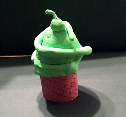 Sculpture of green ice cream.