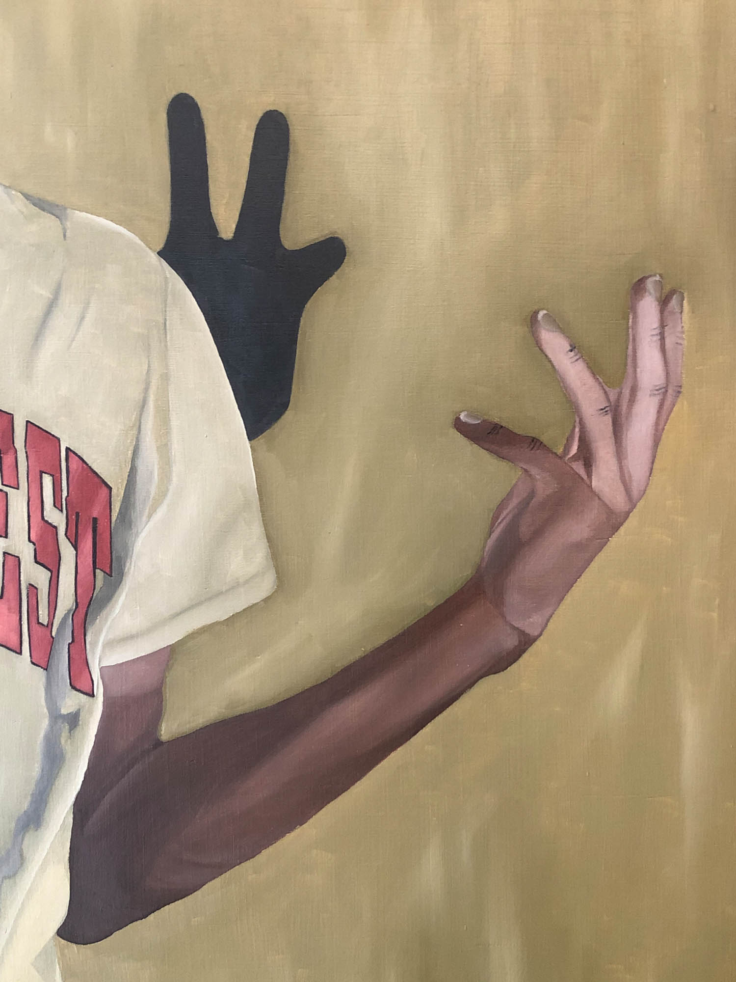 Detailed and textural image of specific and layered brush stroke on the male figure’s right arm and hand. Multiple cool toned and dark toned areas of browns and greens on both the right arm and hand.
