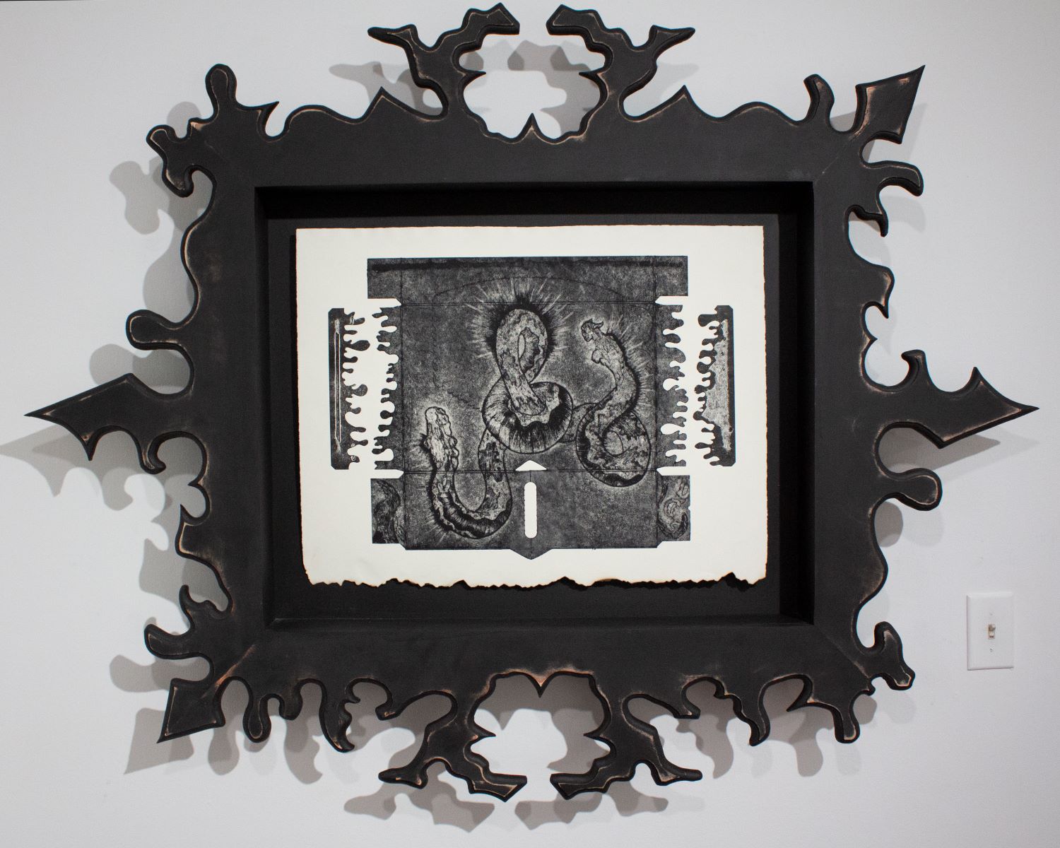 Come, My Sister full shot. Asymmetrical face frame with a antler-like branch reflected on the bottom. Print inset into shadowbox, with burnt paper edges. Deep greydscale with selective highlight wiping.