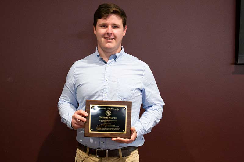 William Martin with his first-year Mississippi State University Building Construction Science Student of the Year Award