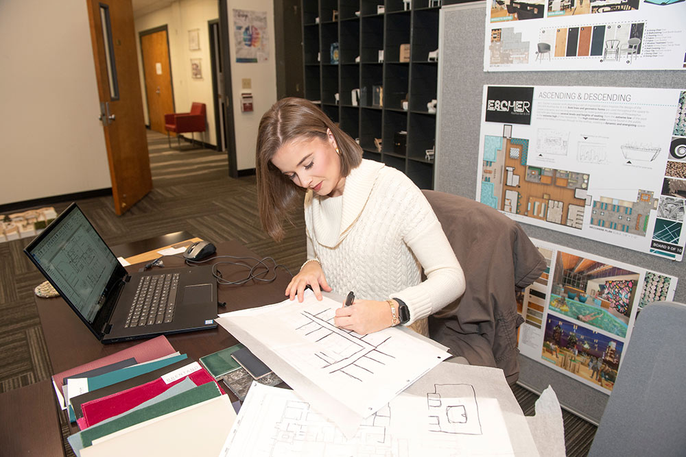 student Hayden Hunt works on a project