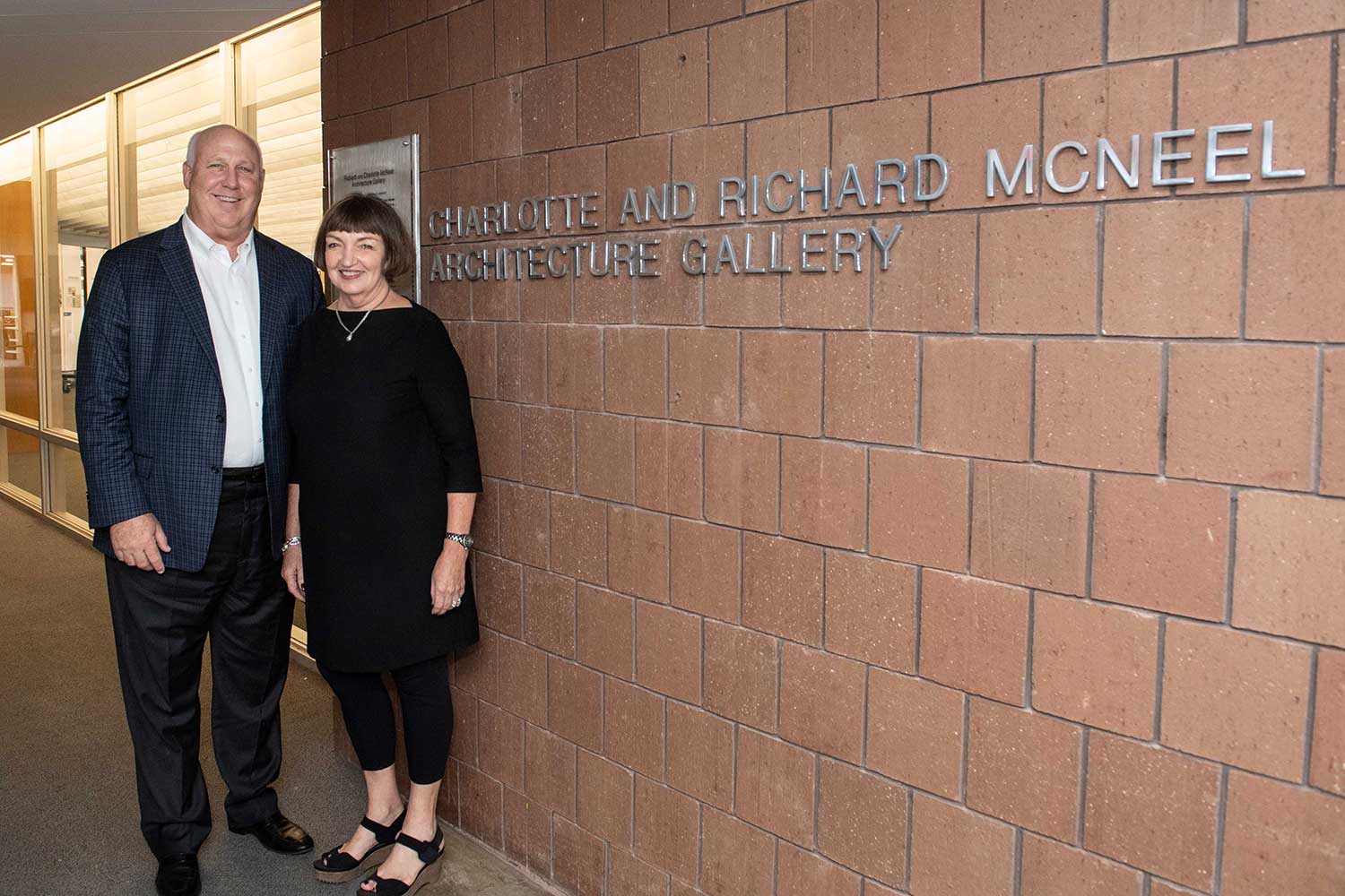 pictured outside of gallery in Giles Hall, left to right, Richard McNeel and Charlotte McNeel