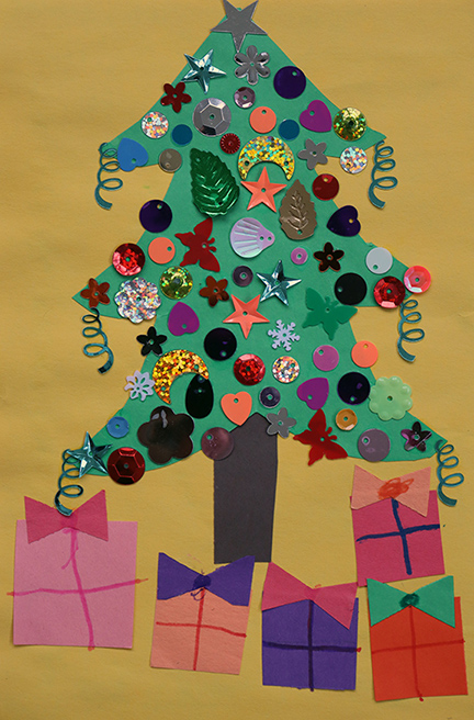 Collage of paper and plastic disks making a Christmas Tree on a yellow background.