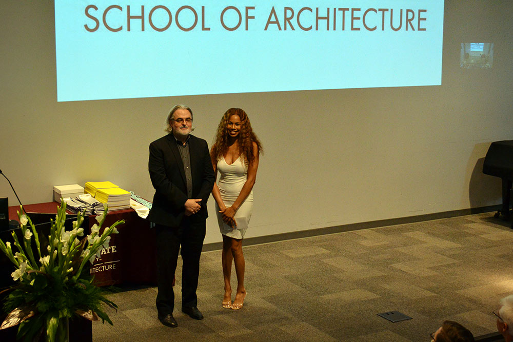 Professor Jassen Callender, left, stands with Kristin Rice