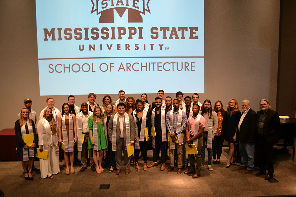 School of Architecture class of 2022 gathered in a group for a photo