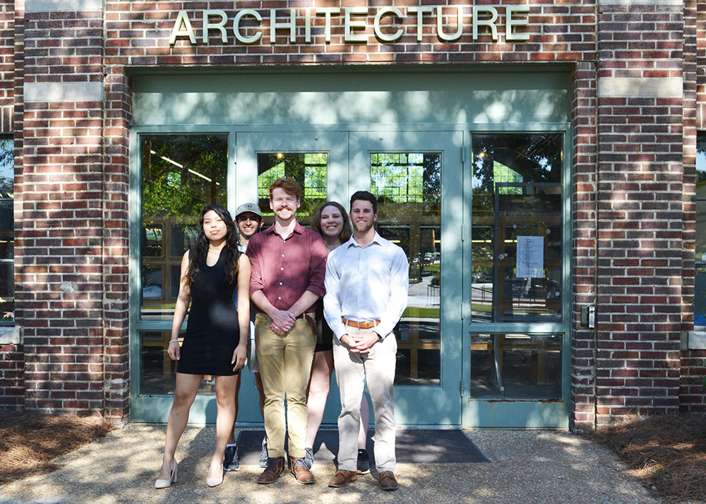 students gather in line for group photo in front of Giles Hall, left to right: Jamie Ferreras (ARC), Caleb Watlington (BCS), William Brotherton (ARC), Megan Plummer (BCS), Austin James (ARC)