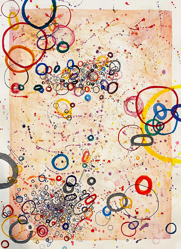 A colored drawing or what appears to be a bunch of colorful circles, almost like bubbles.