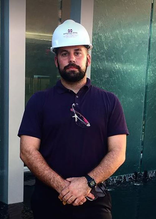 Robert Fatherree poses in hardhat