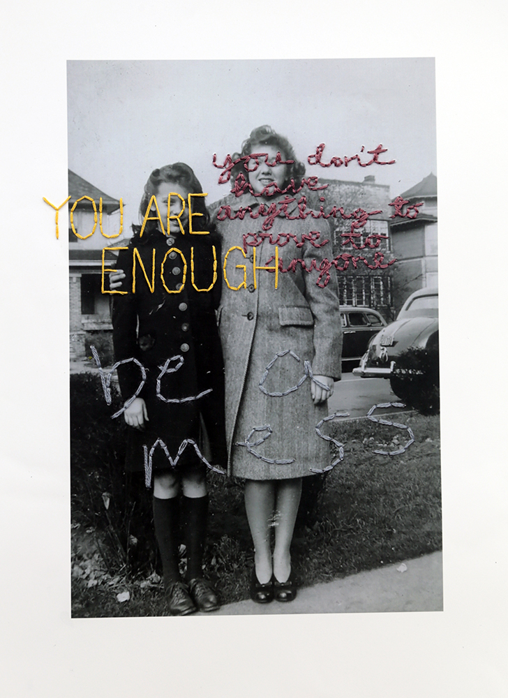 A photograph of a two girls that reads "you are enough, you don't have anything to prove to anyone, be a mess" sewn into it