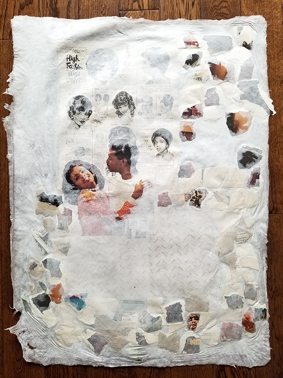 Sheet of white handmade paper with photos illustrations of African American women cut from magazines