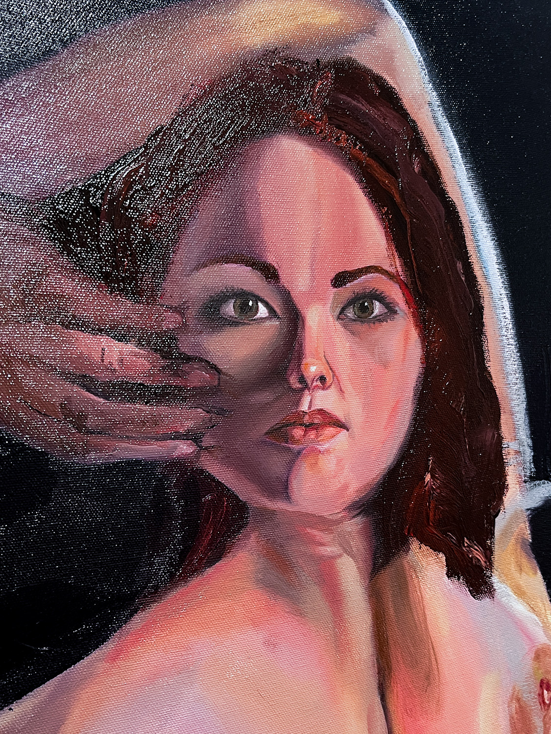 detail of painting - woman's face with hand by it