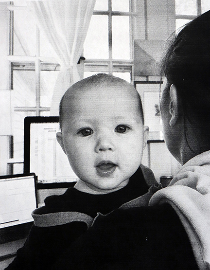Black and white photograph of a baby.