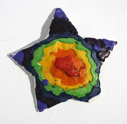 A sculpture of a multi-colored star