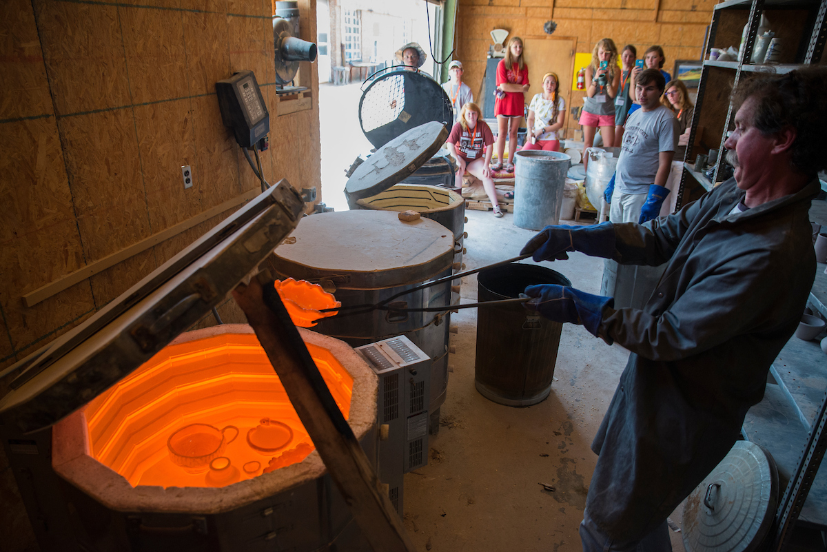 Art Professor Robert Long does a ceramics kiln demo for art campers